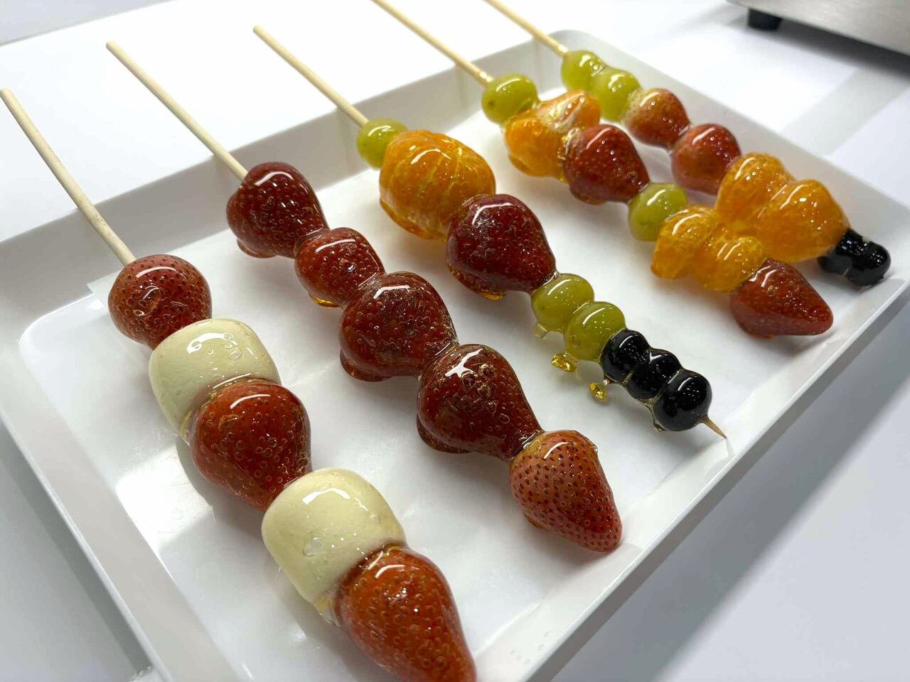 Fruit skewers with a sugar glaze